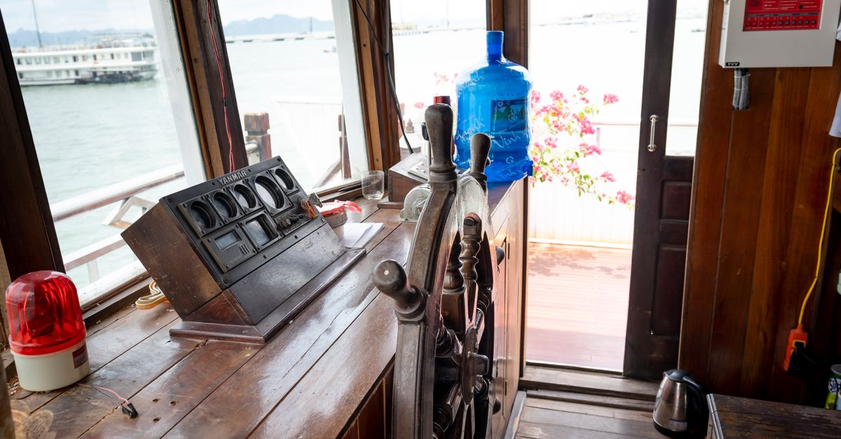 A liveaboard cabin and boat deck prepared for a multi-day dive trip.