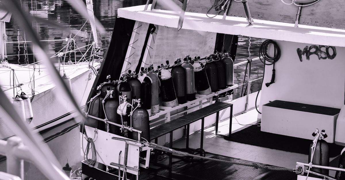 Dive gear prepared for an operator confirmation check before packing.